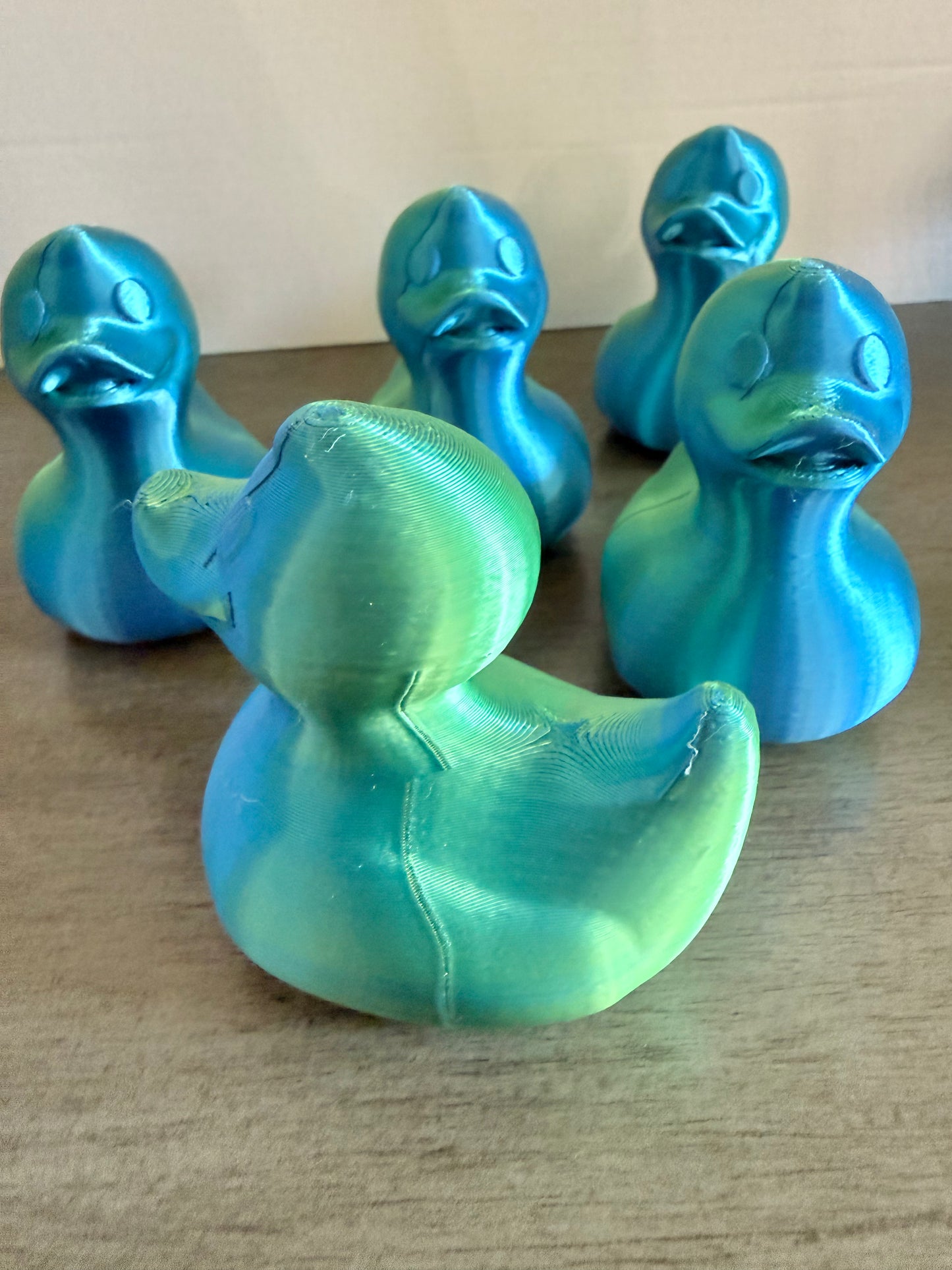 Iridescent cruising ducks