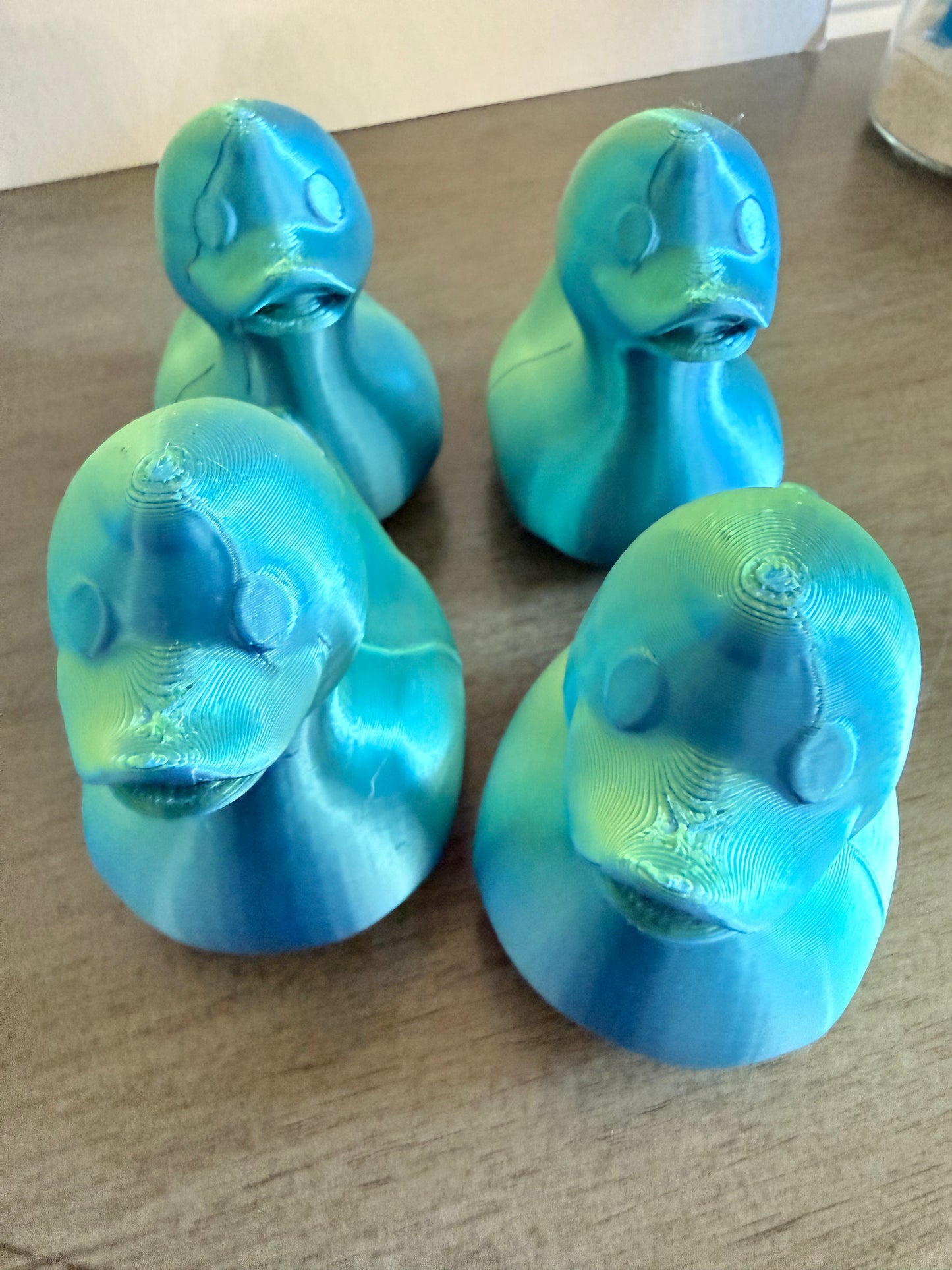 Iridescent cruising ducks